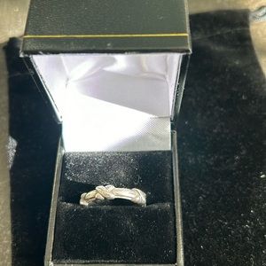 Tiffany sterling silver”X” ring. Size 7